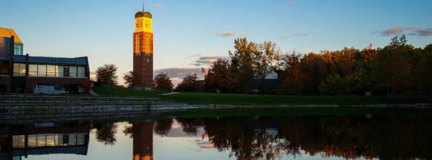 Image of the Cook Carillon Tower over Zumberg pond.